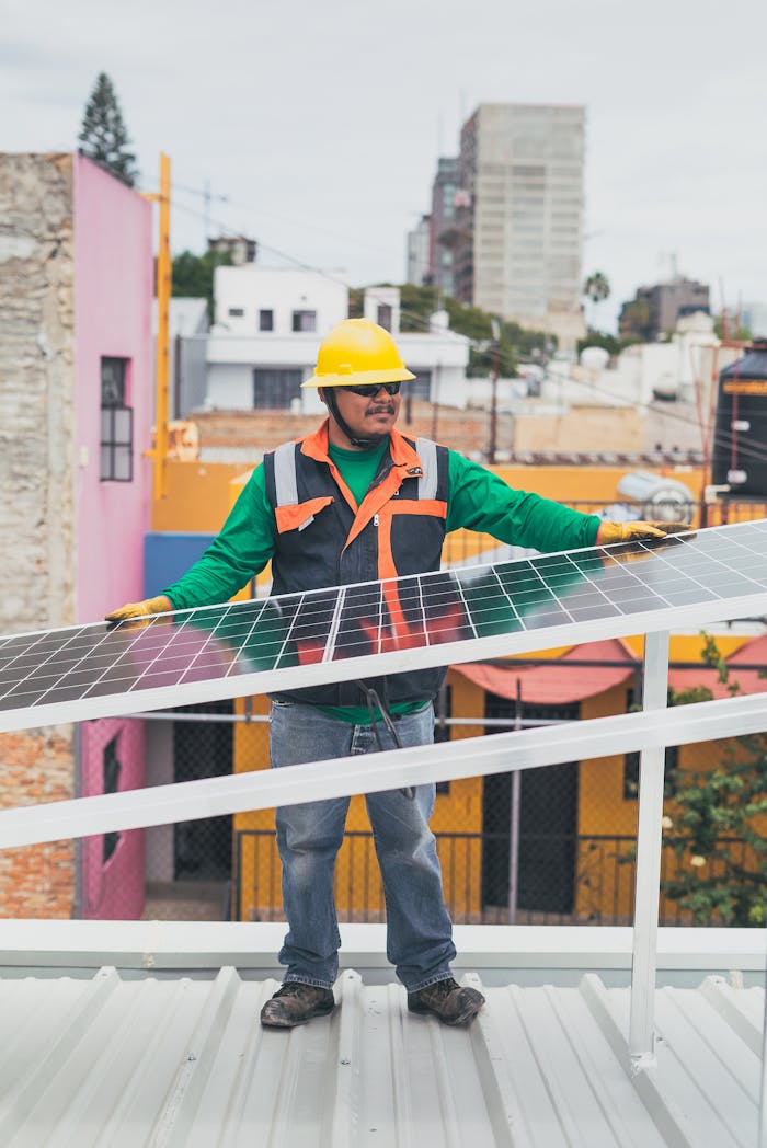 Home A solar technician adjusts photovoltaic panels on a colorful urban rooftop.